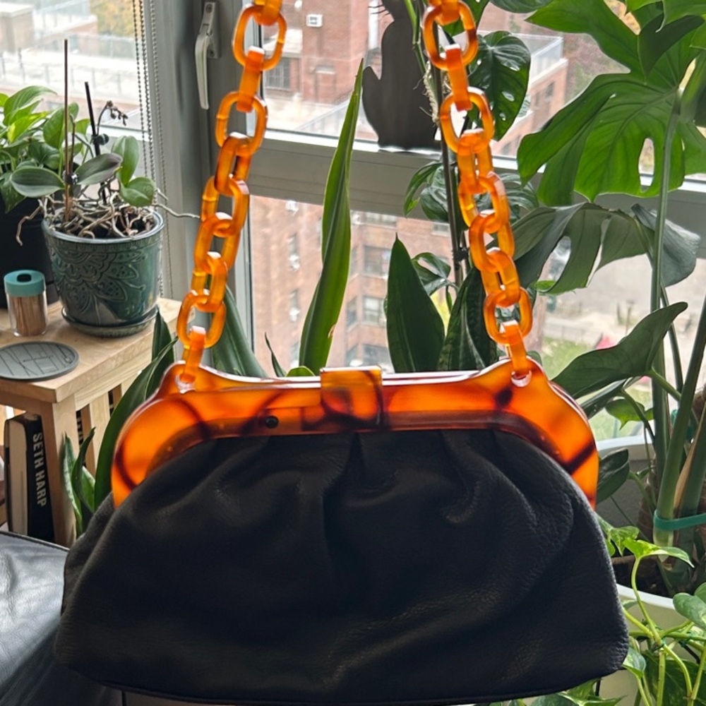 Kate Landry Black Bag with Orange Chain Accent